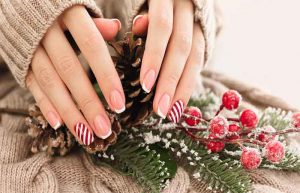 Manicured,Woman's,Hands.,French,Manicure,And,Candy,Cane,Pattern,On